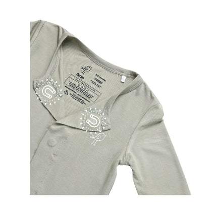 Birdie green sage sleepsuit showing soft sleeve and embroidered bird logo and magnetic closure