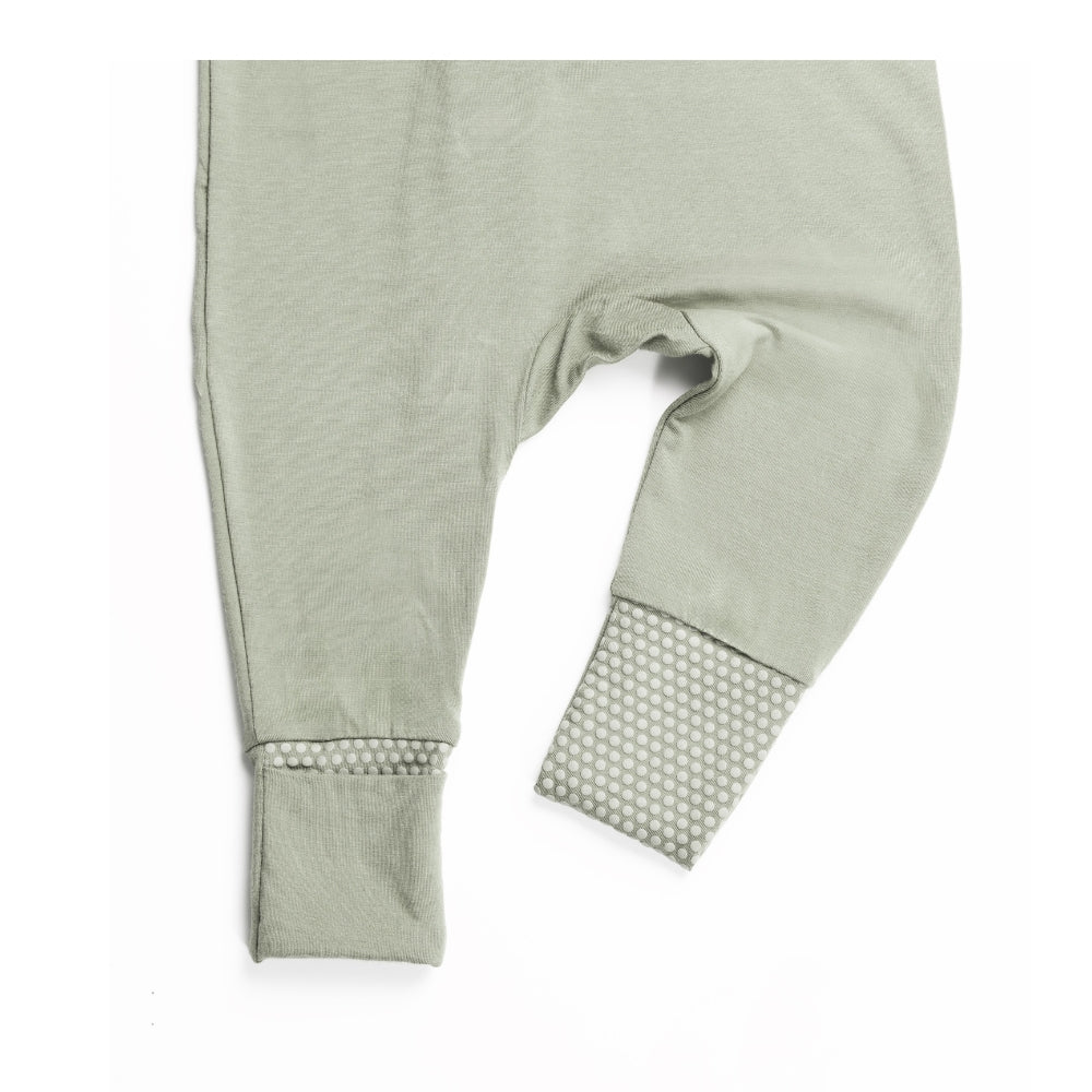 Birdie sage green baby sleepsuit with close-up of anti-slip foot grip convertible