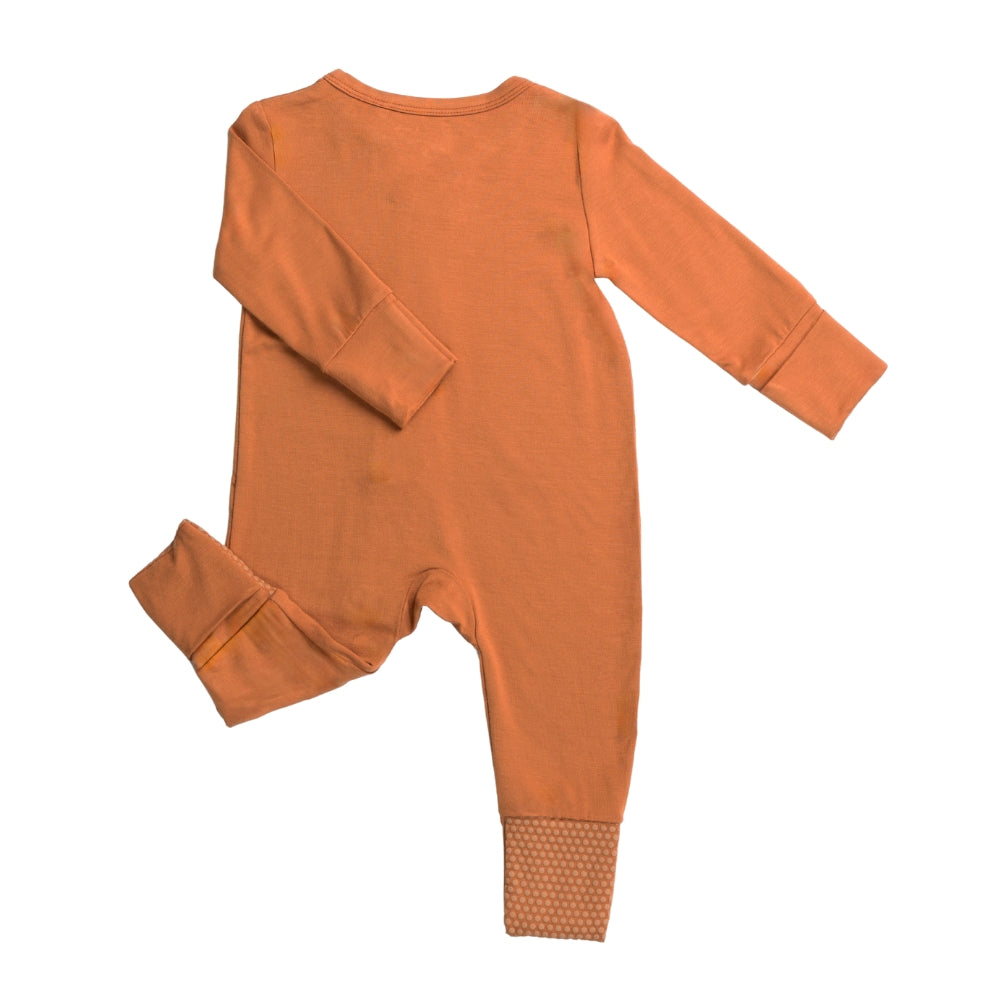 Back of Birdie terracotta orange bamboo baby sleepsuit with fold-over feet and mittens